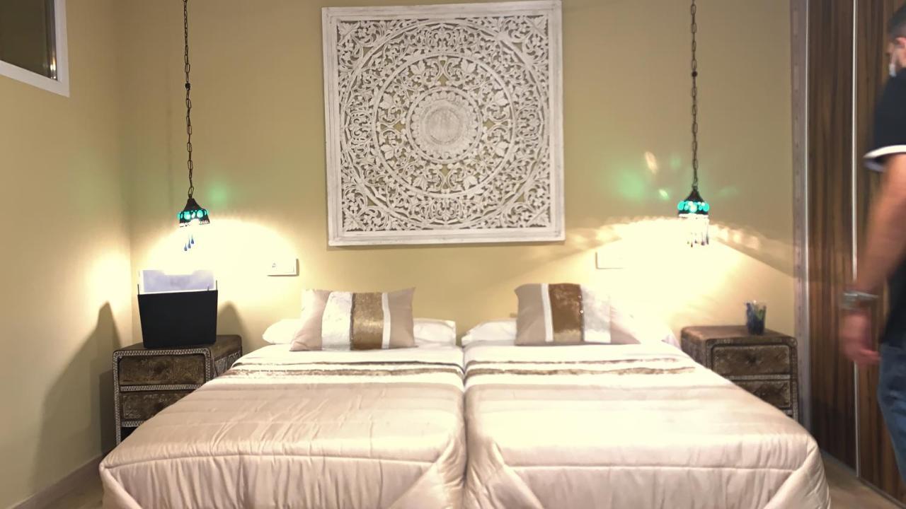 Hotel Apartamentos Seven Rooms Punta Umbria Bagian luar foto