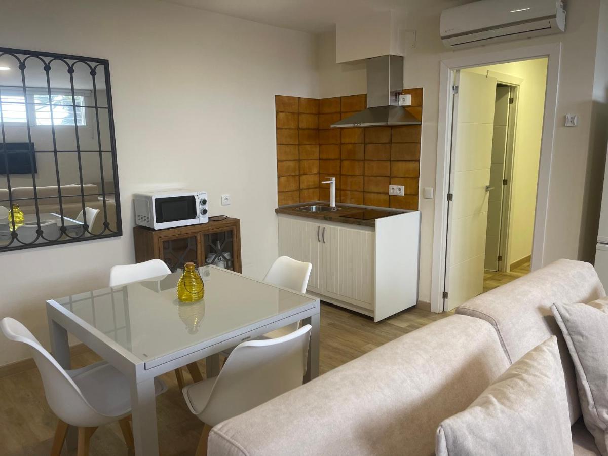 Hotel Apartamentos Seven Rooms Punta Umbria Bagian luar foto
